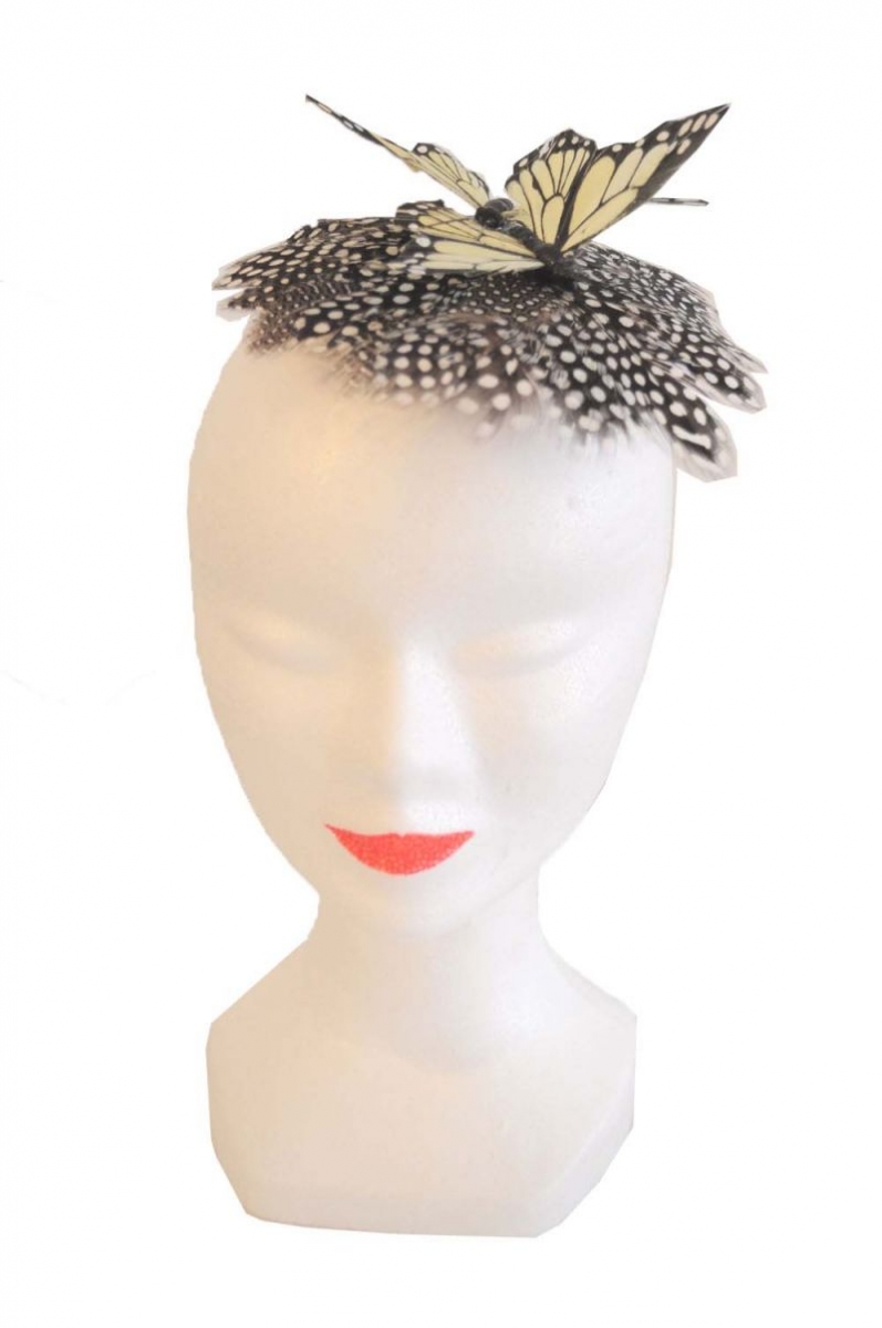 tocado plumas y mariposa